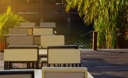 chair To sit Beside the pool The sun is shiningの写真素材