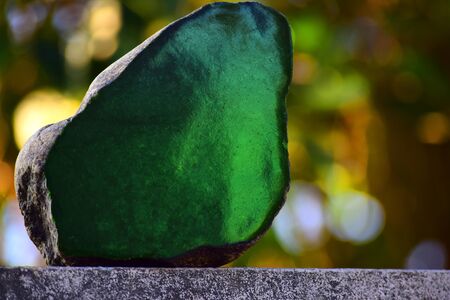 Jade is a real natural jade, lumps on a beautiful natural background.