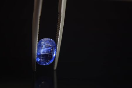 Gemstone The selected blue color is in the gemstone clamps. That is beautiful and expensiveの写真素材