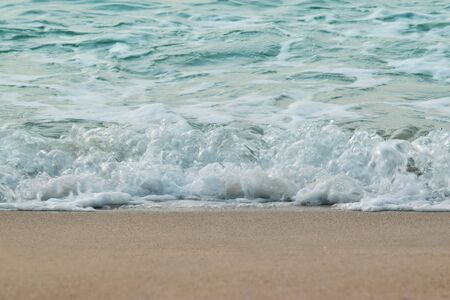 sea At the beach there are sand and beautiful sea waves.の写真素材