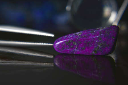 Lapis Is a beautiful natural gemstone on a wooden floorの写真素材