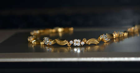 jewelry a gold bracelet set with diamondsの写真素材