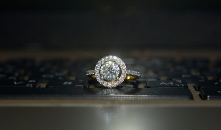 Wedding ring is a gold ring decorated with diamonds.
