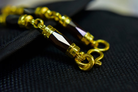 gold bangle decorated with garnet gemsの写真素材