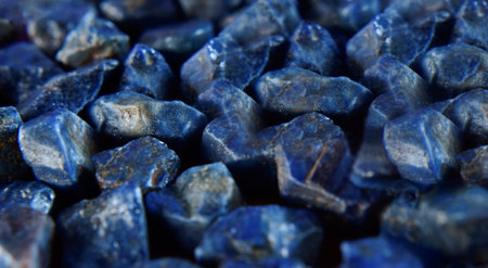 Lapis Is a beautiful natural gemstone on a wooden floorの写真素材