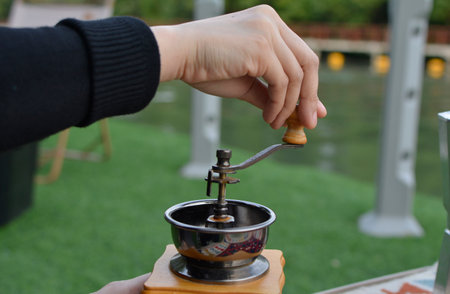 Hands are cooking and holding food.の写真素材