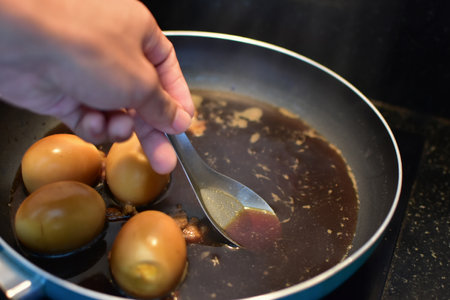 Stewed Eggs Making Stewed Eggs in a hot panの写真素材