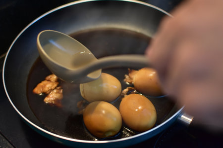 Stewed Eggs Making Stewed Eggs in a hot panの写真素材
