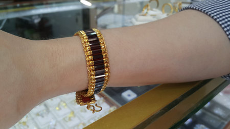 Production of jewelry from gold barsの写真素材