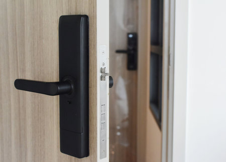 The door is a door locked with a keycard system.の写真素材