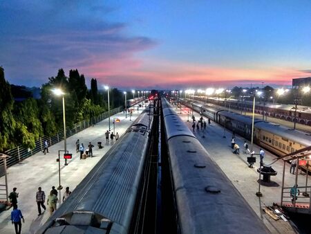 A view of train station with train trackの写真素材