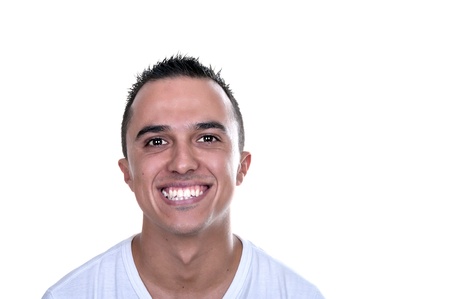 smiling young Latino on white backgroundの写真素材
