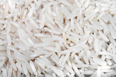 close up of pile of husked basmati rice seeds の写真素材