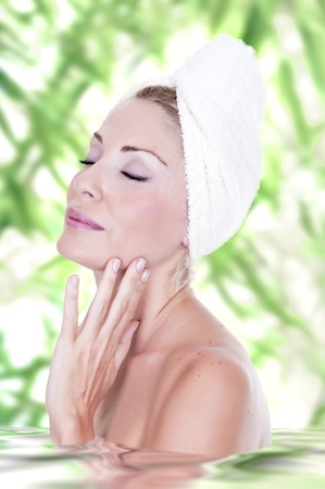 Closeup of beautiful woman in spa center の写真素材