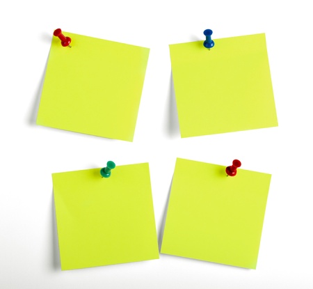 Yellow reminders notes isolated on the white background. 