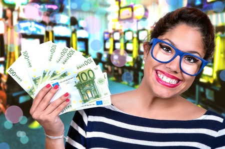 Sexy beautiful young girl in casinoの写真素材