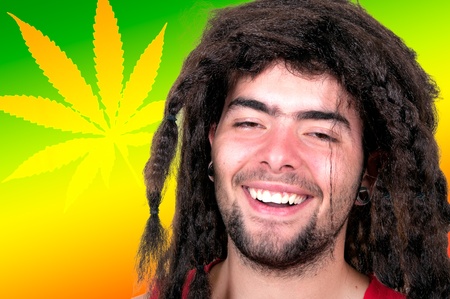 handsome young man with dreadlocks の写真素材