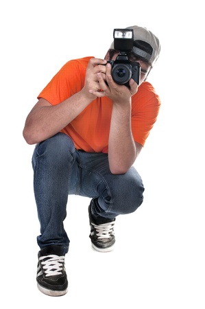 photographer squatting on white backgroundの写真素材