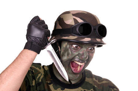 soldier showing a knife on white backgrouns