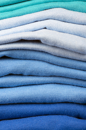 Pile of folded clothes.t-shirtsの写真素材