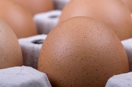 Carton of eggs from chicken farm (selective focus)の写真素材