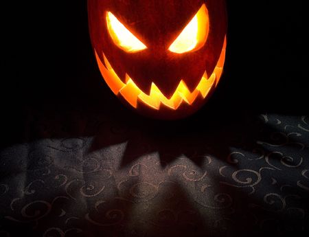 Jack-o-lantern, Halloween pumpkin glowing in the nightの写真素材