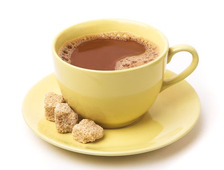 Sweet hot chocolate in a yellow cup.の写真素材