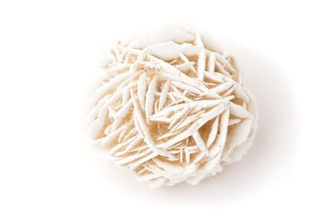 Desert rose (gypsum crystal) close-up, isolated on white.の写真素材