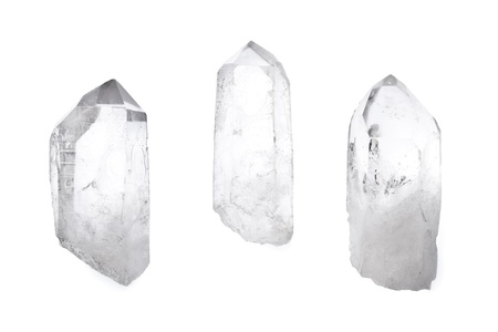 Three big natural quartz crystals isolated on white.の写真素材