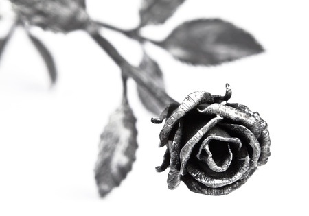 Hand forged metal rose with silver accents on petals.の写真素材