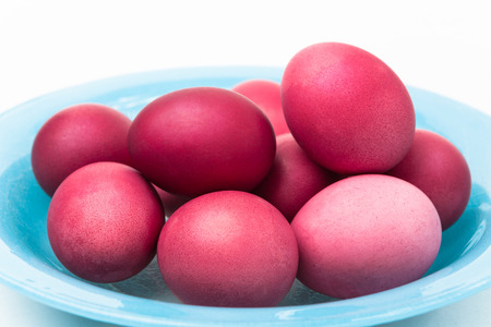 Purplish red Easter eggs dyed with traditional natural coloring - madder root.