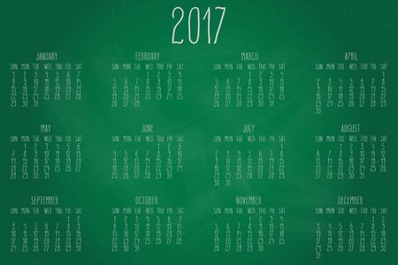 Hand written calendar for the year 2017 over green chalkboard background.のイラスト素材