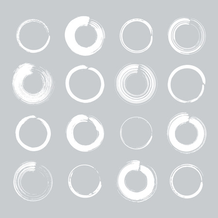 Collection of miscellaneous round grunge brush strokes in white isolated over light grey background. Set of design elements. Vector illustration.のイラスト素材