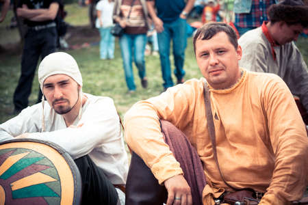 MOSCOW, RUSSIA - JUNE 23, 2013: Medieval citizens in period clothes during the great international yearly festival of historical reconstruction "Times and Epochs"のeditorial素材