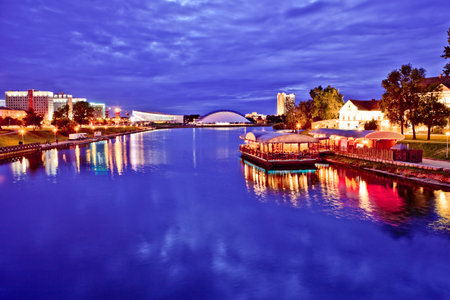 Over the Svisloch river in the night in Minsk, Belarus. Copy spaceの写真素材