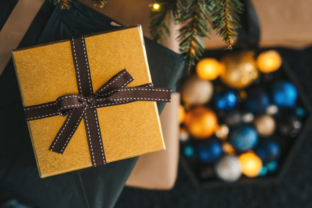 Christmas gift boxes under Chrismas tree. Holiday morning. New year present paper package.の写真素材