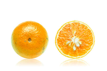 Piece of orange show some texture detail with some seeds isolated on white background with Clipping path.の写真素材