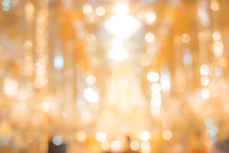 Abstract blurred Buddhist making ceremony inside the temple. Feel like we're stay at the heaven.の写真素材