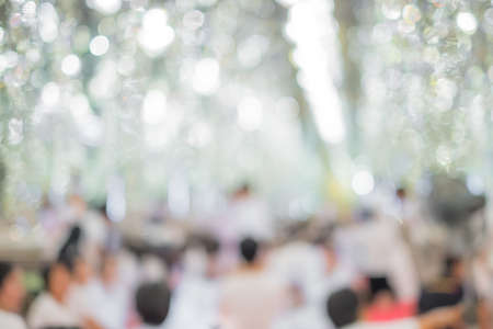 Abstract blurred Buddhist making ceremony inside the temple. Feel like we're stay at the heaven.の写真素材