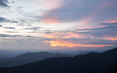 Beautiful dusk scene on the mountain in Doipui Chiangmai, Thailand at sunset.の写真素材