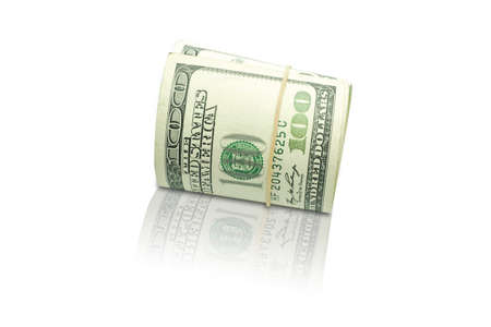 A group of rolled banknotes isolated on white background with clipping path.の写真素材