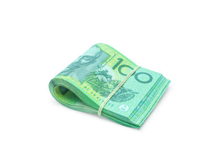 Folded of Australian banknotes isolated on white background with clipping path.の写真素材