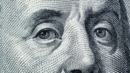 Close up on US dollar banknotes.  Portrait of Franklin on US dollar Banknotes. Shooting by 1:1 Macro lense.のeditorial素材