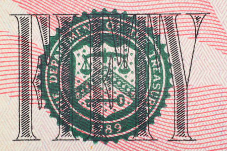 Close up on US dollar banknotes. U.S. Federal reserve system on US Dollar banknotes. Shooting by 1:1 Macro lense.の写真素材