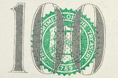 Close up on US dollar banknotes. U.S. Federal reserve system on US Dollar banknotes. Shooting by 1:1 Macro lense.の写真素材