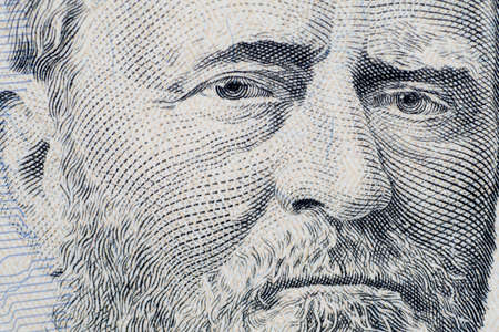 Close up on US dollar banknotes.  Portrait of Grant on US dollar Banknotes. Shooting by 1:1 Macro lense.の写真素材