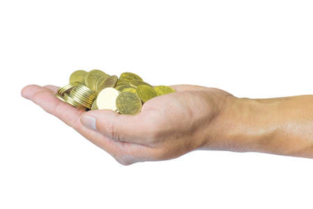 Male hand holding golden coins. Saving, money, finance donation, giving and bussiness concept. Isolated on white backgroundの写真素材
