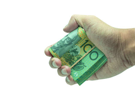 Male hand holding 100 hundred natknotes. Saving, money, finance donation, giving and bussiness concept. isolated on white background with clipping path.の写真素材