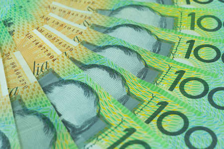 Australian dollar, Australia money 100 dollars banknotes stack on white background with clipping path.の写真素材