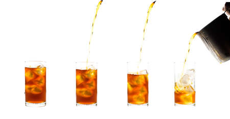 Coffee clod brew process (Method) by French press. Fill-pouring iced americano into a glass of water with iced.  Isolated on white background with clipping path.の写真素材